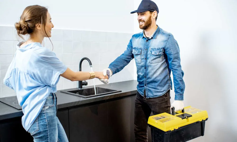 handy-man-with-woman-on-the-kitchen.jpg